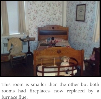 This room is smaller than the other but both rooms had fireplaces, now replaced by a furnace flue.